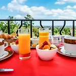 Logis & Restaurant Aux Tauzins 3* 蒙福尔－昂沙洛斯